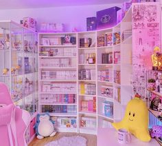 a room filled with lots of toys and shelves full of books on it's sides