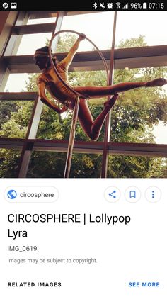 an image of a woman on a pole in front of a window with the caption circospher i lollypop