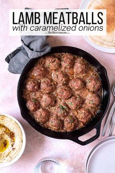 meatballs with caramelized onions in a cast iron skillet next to other dishes