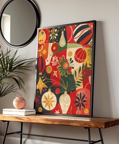 a wooden table topped with a mirror next to a potted plant and a painting on the wall