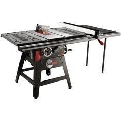 a table saw is on top of a workbench with two tools attached to it