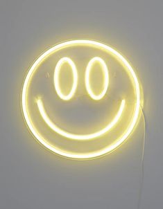 a smiley face with two eyes is lit up