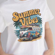 **Summer Vibes T-Shirt** 🌞 **Summer Vibes T-Shirt Embrace the sun and fun with this stylish Summer Vibes T-Shirt, perfect for any summer adventure. 🌴 **Retro Summer Shirt Add a touch of nostalgia to your wardrobe with this Retro Summer Shirt, designed with a vintage feel that's ideal for beach days and summer outings. 😎 **Funny Beach Tee Shirt Make a splash with this Funny Beach Tee Shirt, featuring a playful design that captures the carefree spirit of summer. 🚐 **Retro Van With Surfboards S Graphic Print T-shirt For Summer Vacation, White Tropical T-shirt For Beach Season, Summer Tops For Beach Season Activities, Short Sleeve T-shirt For Summer Activities, Summer T-shirt For Beach Season Activities, Graphic Print T-shirt For Beach Season, Crew Neck T-shirt For Beach Season, Crew Neck Tops For Beach Season Summer Activities, Beach Graphic Tee With Sublimation Print