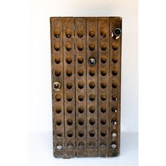 an old wooden door with holes in the front and side panels on each side, set against a white background