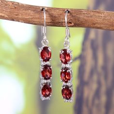 "This Earrings features a beautiful Garnet gemstone set in a customized sterling Silver A lovely Earring to your jewelry collection ! Item Description ! => Gemstone Type - Garnet => Gemstone Size - 5 x 7 MM => Gemstone Cut - Faceted Oval => Metal Type (Main Photo) - 925 Sterling Silver =>Gemstone Quality: AAA+ =>Secondary Stone: cubic zircon (small white stone) ? Shipping information : ? Tracking number ? ? Expedited / Express shipping - check our \"shipping upgrades\" when you Garnet Gemstone Earrings, Garnet Drop Earrings With Ear Wire, Garnet Birthstone Drop Earrings, Plus Size Rings, Rose Quartz Ring, Garnet Earrings, Ruby Earrings, Earrings Minimalist, Earrings Long