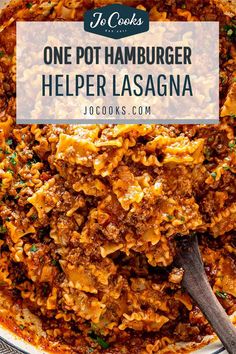 one pot hamburger helper lasagna in a white bowl with a wooden spoon