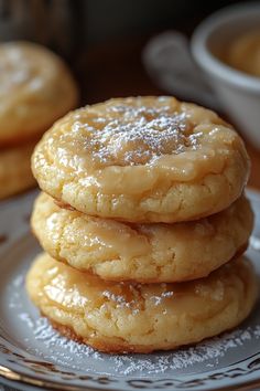 a stack of cookies sitting on top of a white plate