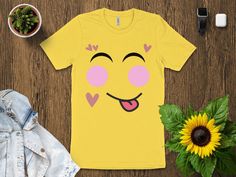 Express with Emoji: Yellow Shirt Collection 😀 Elevate your wardrobe with our emoji-inspired yellow shirts, adding a dash of fun and expression to your style. Why Choose Our Emoji Yellow Shirts? ✨ Support a Small Business: Your purchase directly supports our creative journey, helping us bring more cheerful designs to life. 😃 Express Yourself: Wear the iconic emoji face proudly and let your emotions shine through your fashion. 🌟 Premium Quality: Crafted with care, our shirts offer comfort and vibrant style, perfect for a pop of color. 🎁 Perfect Gift: Share the joy of expression with a friend, and gift them a shirt that's as bright as their smile. Join us in celebrating the art of expression. Shop now and add a touch of cheerfulness to your attire! 𝐏𝐑𝐎𝐂𝐄𝐒𝐒𝐈𝐍𝐆 𝐓𝐈𝐌𝐄 𝗔𝗡𝗗 𝐒? Funny Yellow Tops With Funny Print, Yellow Tops With Funny Print, Fun Yellow Crew Neck Shirt, Yellow Casual Tops With Funny Text, Yellow Casual Top With Funny Text, Casual Yellow Tops With Funny Text, Fun Yellow Tops With Funny Print, Playful Yellow Top With Funny Print, Cute Yellow Shirt With Graphic Print