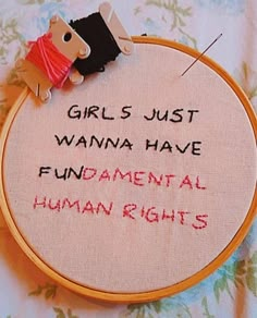 a cross stitch hoop with the words girls just wanna have fundamental human rights on it