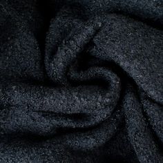 Snuggle up in this high end designer 100% wool Boucle sweater knit! This is fabric has a heavy weight and a mechanical stretch which will sew up a lovely sweater, cardigan, jacket or wrap. Close up of selvedge. (second photo) Winter Wool Sweater With Soft Texture, Soft Wool Sweater For Winter, Textured Wool Outerwear For Cold Weather, Wool Textured Knit Outerwear For Cold Weather, Cold Weather Textured Knit Wool Outerwear, Cozy Black Wool Outerwear, Charcoal Winter Sweater, Black Soft Textured Winter Sweater, Charcoal Wool Sweater For Fall