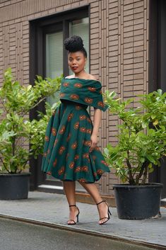 If opulence was a dress, it would be the Oyin African Dress. This dress is made of high quality and soft fabric, very comfortable to wear. Cape sleeve off-shoulder dress, elegant and beautiful. This cape sleeves off-shoulder dress with an elegant design is perfect for your wedding party, cocktail party, prom, evening, and more. Ohh and we can't forget the amazing print! Two side pockets. Fully lined 100% cotton, no stretch. Handmade in Nigeria Dress length is 45 inches. Model is wearing size sma Nigeria Dress, Brown Midi Dress, Ankara Style, Cape Sleeves, African Prints, African Attire, Dress Elegant, African Dress, African Print