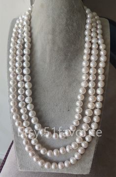 Jewelry: fresh water pear, genuine cultured pearl, real pearl Color: white Grade: AA, have beautiful natural blemish and rings on pearl's surface Size: about 11-11.5 mm, error range: ±0.5mm Shape: near round, not so round Length: offer 60-100 inch, photos shown is about 80 inch. Handwork: knotted between every 2 pearl bead Metal: -,no clasp Shipping: I will send out your order in 1-5 business days. Usually will take about 25-50 business days. As seller, I really hope you will receive your parcel Luxury Pearl White Pearl Necklace For Gift, Elegant Large Beaded Pearl White Necklace, Luxury White Pearl Necklace, Elegant Style, White Hand-strung Pearl Necklaces, White Multi-strand Pearl Necklace For Party, Hand-strung Pearl White Round Beads Pearl Necklace, Bridesmaid Necklace Gift, Real Pearl Necklace, Wedding Gifts For Bridesmaids