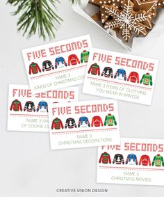 five personalized christmas gift tags with gingerbread cookies in the background