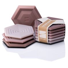 chocolates are stacked on top of each other in the shape of hexagonal shapes