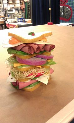 a stack of sandwiches sitting on top of a table