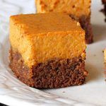 several pieces of cake on a white plate