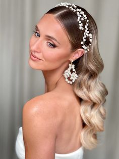 a woman wearing a bridal hair comb