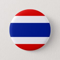 a red white and blue button with the flag of thailand on it's side