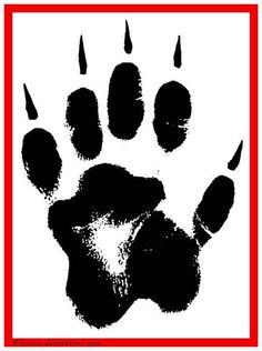 an animal's paw is shown in black and white with red border around it