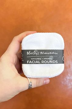 Interested in making your beauty routine more sustainable? A switch to Marley's Monsters reusable, 100% organic cotton Facial Rounds is an easy swap for disposable cotton balls. Using Facial Rounds can replace thousands of single use cotton balls with repeated use (like, for years). Try with your favorite makeup remover! **Contents** * 2-ply 100% organic cotton flannel * Edges are sewn for durability and to prevent fraying **Care/Import** * Machine wash warm with like colors, dry in dryer. Facial Rounds are not pre-washed, so expect some shrinkage. We recommend washing Facial Rounds in a Mesh Laundry Bag to keep them together in the wash. * Handmade by Marley's Monsters in Eugene, Oregon. **Dimension** * Each Facial Round measures about 3" in diameter | Marley's Monsters Organic Cotton Fla Organic Facial, Cleansing Pads, Favorite Makeup, Remove Makeup, Mesh Laundry Bags, Cotton Balls, Organic Makeup, Face Cloth, Cotton Ball