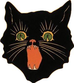 a black cat with green eyes and an orange hand on it's face is shown