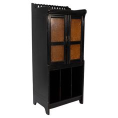 an old wooden cabinet with glass doors