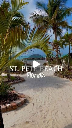 a sandy beach with palm trees and the words st pelle beach written in white