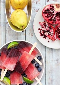 watermelon, blueberries and pears on skewers in white bowls