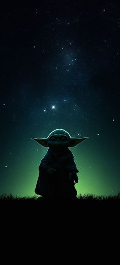 the child yoda is looking up at the stars