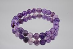 Welcome to my "SusansMysticGems" Shop Purple Dragon Vein Agate Bracelet | Protection Symbol Jewelry | Women's Healing Crystal Elasticated Bracelet | Stretch Beaded Agate Bracelet Our Purple Dragon Vein Agate Women's Bracelet, available in 6mm and 8mm beads, is more than just an accessory--it's a statement of protection, transformation, and spiritual grounding. Designed to complement any wardrobe, this bracelet makes an ideal gift for yourself or a loved one seeking balance and beauty.  Key Featu Purple Veins, Purple Dragon, Making Bracelets, Dragon Vein Agate, Purple Agate, Symbolic Jewelry, Healing Crystal Jewelry, Agate Bracelet, Agate Beads