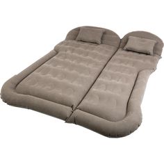 an inflatable mattress with two pillows on it