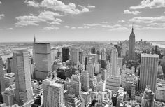 black and white photograph of new york city from the top of the empire state building