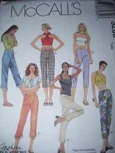 a woman's top and pants sewing pattern from the 1970's, with two women in different outfits