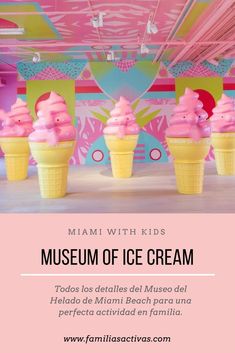 an ice cream shop with pink and yellow cones on the ceiling, and text that reads museum of ice cream