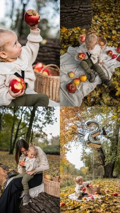 a woman holding a baby in her arms while sitting on a tree branch with apples