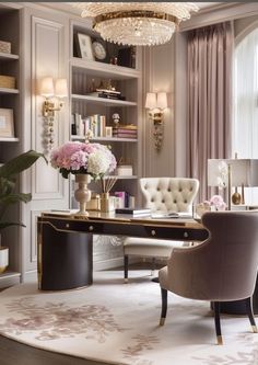 an elegant home office with chandelier, desk and chairs