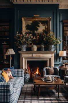 a living room filled with furniture and a fire place in front of a painting on the wall