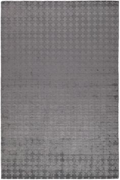 a gray rug with squares on it