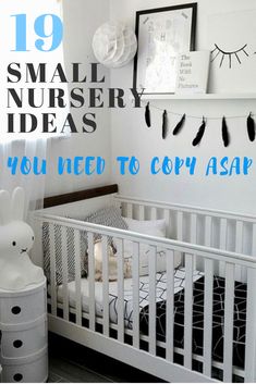 a white crib in a room with black and white decor