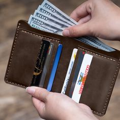 This Brown Bi-Fold Vertical Wallet comes with 6 credit card pockets and one large bill compartment. It is marked by hand-stitched edges and raw simplicity. • 6 Credit Card Pockets • 1 Large Bill Compartment • Premium Crazy Horse Leather • Approximate size: 3.8" x 4.5" Simple Leather Wallet, Bracelet Apple Watch, Brown Wallet, Black Wallet, Crazy Horse, Hand Stitched, The Back, Credit Card, Card Holder