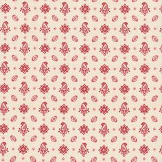 a red and white pattern on fabric