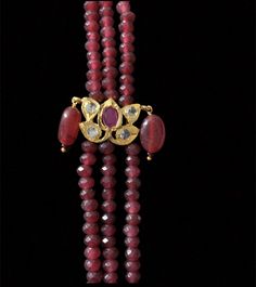 long necklace made using glass Ruby beads cz polki stones gold plated length 12 inch on each side Latest Ruby Necklace Designs, Ruby Necklace Designs, Ruby Beads, Silver Jewelry Earrings, Ruby Necklace, Silver Jewelry Pendant, Jewelry Design Necklace, Stone Gold, Beads Necklace