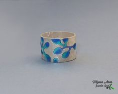 "Silver Enamel Band Ring, Enamel Band Ring, Silver Band Ring, Flower Band Ring, Blue Enamel, Enamel Ring, Handmade Ring, Band Ring, 925 Silver Jewellery. Beautiful Silver Enamel Band Ring made of sterling silver and enamels. This handmade silver ring is a special flower design on a silver band. The band ring is perfect to wear everyday. Details: Weight: 5.7 g Band Width: 12 mm = 0.47\" Diameter- size: 6 US available. Other sizes: Please select your Ring size and I would customize it for you. Enj Cheap Adjustable Silver Enamel Ring, Luxury Unique Enamel Ring In Sterling Silver, Luxury Handmade Silver Enamel Ring, Cheap Blue Enamel Jewelry, Affordable Silver Enamel Ring For Gift, Luxury Blue Enamel Ring As Gift, Blue Enamel Earrings, Cloisonne Jewelry, Flower Band