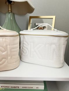 Leather open top bag with skin embossed in white This bag is GORGEOUS Perfect train case for travel and storing all makeup! 7.5” W x 5” H x 5.2” D White Rectangular Cosmetic And Toiletry Storage, White Box Bag With Removable Pouch, White Rectangular Box Bag With Removable Pouch, Portable White Cosmetic And Toiletry Storage, White Rectangular Box Bag For Daily Use, White Rectangular Cosmetic Bag For Travel, Portable White Cosmetic Bag For Travel, White Cosmetic And Toiletry Storage For Travel, White Portable Cosmetic And Toiletry Storage For Daily Use