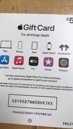 an apple gift card is displayed on a table