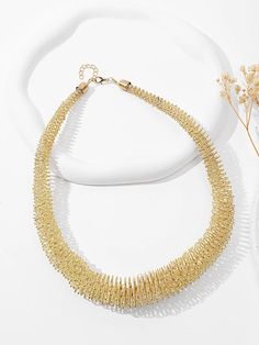 Overview:
Elevate your style with this stunning gold choker necklace. Crafted from hypoallergenic and eco-friendly stainless steel, it features a wide braided mesh chain for a unique and luxurious look.
Key selling points: Hypoallergenic and eco-friendly material, elegant and stylish design, wide braided mesh chain for a unique look.
Specification/Features: Made of gold-plated stainless steel, measures 16 inches in length, is anti-allergy and eco-friendly, and is perfect for everyday wear or spe Rose Gold Plated Jewelry For Party, Plated Crystal Jewelry For Parties, Minimalist Crystal Jewelry For Parties, Plated Fine Jewelry For Party, Crystal Plated Party Jewelry, Trendy Yellow Gold Jewelry For Weddings, Party Crystal Plated Jewelry, Trendy Yellow Gold Wedding Jewelry, Metal Jewelry Ring With Plating