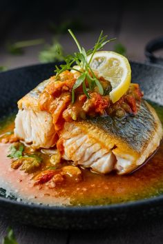 Grilled fish fillet topped with tomato salsa and garnished with a lemon slice and fresh herbs. Sauces For Fish, Sauce Ideas, Whole Fish Recipes, Delicious Sauces, Seafood Dish Recipes, Creamy Recipes, Private Kitchen, Classic Recipes, Cod Recipes