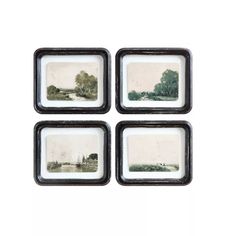 four black and white photo frames with trees on them