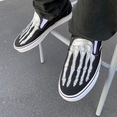 These custom Vans Slip On Shoes have been customized with skeleton bones of your feet. Perfect for the Horror Scary Movie fan and especially getting ready for Halloween this October. These Vans shoes have canvas uppers. Vulcanized waffle rubber outsoles. For Men and Women. Designed by Blake Barash. We buy each pair of shoes BRAND NEW. Each pair is made to order, please make sure you put in the correct shoe size before you check out. The ink is permanent and will never come off, fade away, or pee Custom Vans Slip On, Skeleton Shoes, Custom Vans Shoes, Vans Slip On Shoes, Embroidered Converse, Embroidered Shoes, Vans Slip On, Custom Vans, Womens Wedding Shoes