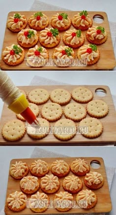 two trays filled with crackers on top of a wooden cutting board next to each other